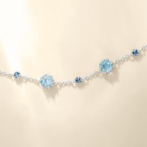 Bracelet tennis saphir bleu topaze taille ronde, chaîne maillons pierres précieuses bleu marine, style audacieux pour femme, argent sterling 925, symétrique - Product Image 1