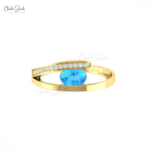 Venta caliente Natural 7x5mm Corte ovalado Topacio azul suizo y Diamante Anillo de vástago dividido Anillo de derivación de oro sólido de 14K Distribuidores al por mayor - Product Image 3