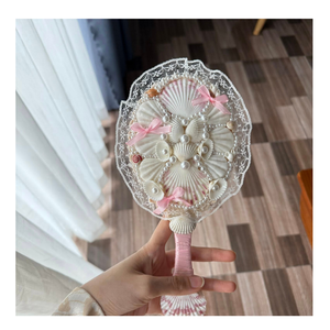 Refined seashell <b>mirror</b> crafted from natural shells providing decorative solution for households resorts and boutique shops - Product Image 3