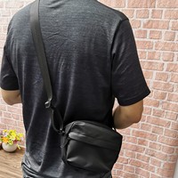 Tas pundak pria kasual gantung diagonal satu bahu Bunylon Oxford sederhana dan misterius tas pundak mendaki luar ruangan tunggal kecil