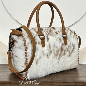 กระเป๋าหนังวัวแท้คุณภาพสูงรุ่นใหม่สำหรับผู้หญิง กระเป๋าถือหนังแท้สุดหรูทันสมัยสำหรับใช้ในชีวิตประจำวันและการเดินทาง - Product Image 1