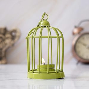 Bougeoir en fer orné pour lampes à thé avec défilement détaillant un look vintage classique et une lueur de bougie ambiante douce - Product Image 2