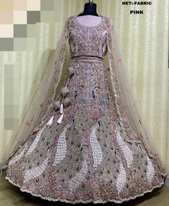 Wholesale Exquisite Pink <b>Net</b> <b>Fabric</b> Embroidered Lehenga Choli Set with Intricate Peacock Motifs Tassel Accents - Product Image 6