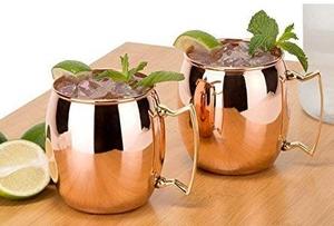 Tasse élégante en cuivre d'aspect bruni et de forme vintage, idéale pour la présentation de boissons dans les cafés ou les événements en plein air. - Product Image 2