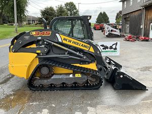 Minicargadora de pista compacta eficiente New Holland C345 con cubo a la venta - Product Image 2