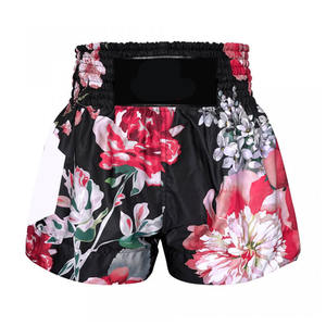 Pantalones cortos de alto grado Unisex Muay Thai MMA Gym Boxing Kickboxing Logo personalizado Servicio OEM Ropa de artes marciales para hombres y mujeres - Product Image 1