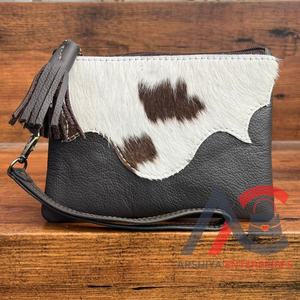 ¡Novedad de 2025! Bolso de mano de cuero de vaca a la moda para mujer, bolso de mano con cremallera y borlas de cuero genuino, bolso de teléfono de gran capacidad - Product Image 1