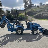 TRACTOR LS MT125 HST CON CARGADOR Y RETROEXCAVADORA EN VENTA