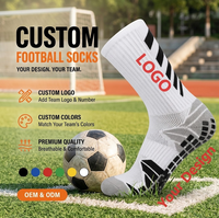 Chaussettes de football personnalisées à forte valeur ajoutée Chaussettes à prise en main d'usine Chaussettes antidérapantes