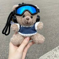 Peluches d'hiver en gros : ours en peluche avec lunettes de ski, pulls à motif cœur, écouteurs, mini-ours en peluche porte-clés