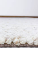 Vente en gros de laine de Nouvelle-Zélande 100% naturelle de qualité supérieure, crème beige moderne, tissage bouclé artisanal, texture douce et luxueuse