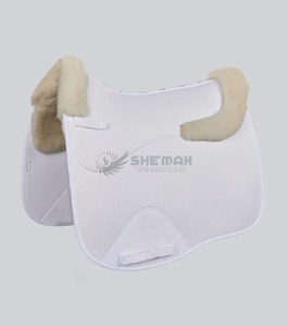 Strong quilted cotton saddle <b>pad</b> with breathable layers keeping your horse <b>cool</b> and comfortable in motion Saddle <b>Pads</b> - Product Image 4