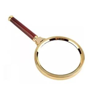 Loupe décorative moderne au fini or brillant pour bureau ou salle d'étude Article en métal à prix raisonnable - Product Image 1