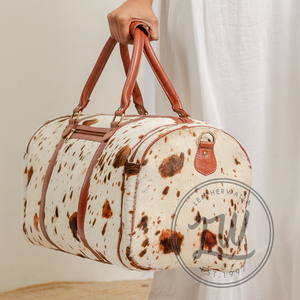 Vente en gros de sac polochon en cuir véritable à poils de vache avec logo personnalisé Bagage de voyage week-end et sac de voyage à main - Product Image 5