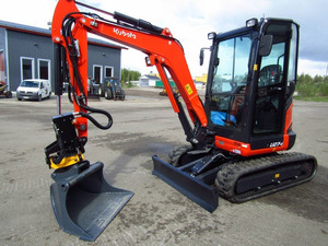 รถขุดขนาดเล็ก Kubota U27-4 พร้อมห้องโดยสารและใบมีดดันดิน สีส้มดำ - Product Image 5