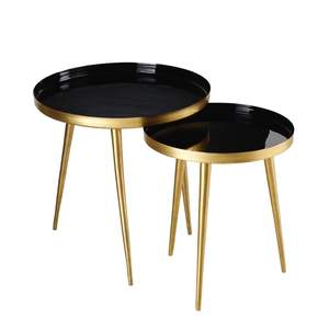 Table d'appoint ronde moderne en laiton avec pieds noirs élégants pour un salon stylé et une touche de décoration contemporaine - Product Image 5