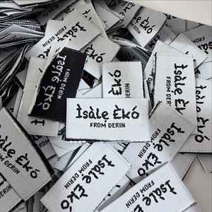 ผ้าทอป้ายยี่ห้อตามสั่งพร้อมโลโก้2X5ซม. พับตรงกลางพับได้ด้วยเลเซอร์ - Product Image 3