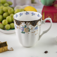 Vente en gros de tasse en céramique de nouveau style de haute qualité en porcelaine de conception de fleur tasse à café tasse à thé