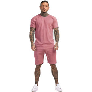 Conjunto de verano corto de fábrica a precio barato para hombre, traje completo al por mayor, conjunto de traje corto tipo uniforme para hombre, trajes de 2 uds ajustados Unisex - Product Image 1