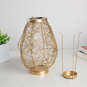 Elegant Gold Wire Lantern Stylish <b>Lighting</b> for Any <b>Space</b> Gold Wire Lantern Perfect for Creating a Cozy Warm Glow - Product Image 5