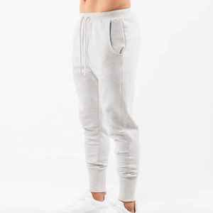 Pantalons de jogging décontractés pour homme, vente chaude en usine, pantalon de sport de basket-ball, pantalon de course, coupe régulière, coupe-vent, 100% nylon, hiver - Product Image 1