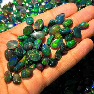 โอปอลเอธิโอเปียสีดำธรรมชาติ รูปไข่เรียบ ขนาด 8x10-10x14 มม. โอปอลไฟแบบหลวม สำหรับทำเครื่องประดับ ราคาโรงงาน - Product Image 3