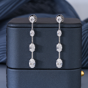 Approvisionnement en gros de boucles d'oreilles en or jaune 14 carats avec diamants synthétiques de taille ovale pour les détaillants de bijoux haut de gamme - Product Image 1