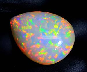 Étonnante pierre précieuse de cabochon de poire d'opale éthiopienne-Welo Rainbow Flashy Opal Gems-Lisse Loose Huge Stone For Jewelry Purpose - Product Image 6