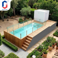 Piscine hors sol moderne avec cascade et panneau latéral transparent pour jardin, villa, terrasse extérieure