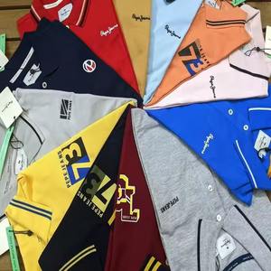 Algodón de Bangladesh para camisa Estilo de golf Diseño de botones con cremallera Collares excedentes Mangas cortas Diseño de piqué colorido Lote de existencias - Product Image 1