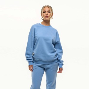 Sudadera azul de mujer de alta calidad con tela suave y ajuste relajado perfecto para el uso diario informal - Product Image 3