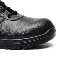 Chaussures de sécurité en cuir véritable poli pour hommes à usage industriel avec toutes les caractéristiques de sécurité nécessaires pour une utilisation en usine