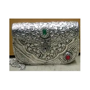 New Arrival Traditional Design German Silver Clutch with Red and Green Embossed Stone for Gifting Purpose Use