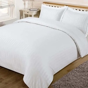 Le drap de lit plat blanc minimaliste de haute qualité pour les intérieurs indiens modernes améliore l'esthétique de la chambre avec une simplicité pure - Product Image 1