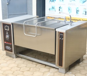 Sartén basculante de inducción industrial SS 304 inclinación automática 8 niveles de calor multifunción 60% cocina a granel eficiente de la energía - Product Image 1