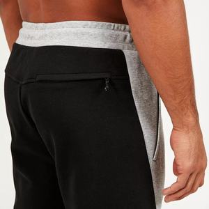 กางเกงวิ่งขายัดรูปเกอร์สีเทามีซิปกระเป๋าสำหรับออกกำลังกายเล่นยิมฟิตเนสแบบพอดีตัวแห้งเร็วระบายอากาศได้ดี - Product Image 6