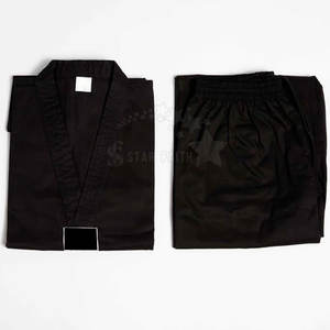 Premium algodón mezclado Judo Jiu Jitsu Kimono uniforme entrenamiento duradero Gi con logotipo frontal pantalones cortos estilo para hombres y mujeres luchadores - Product Image 4