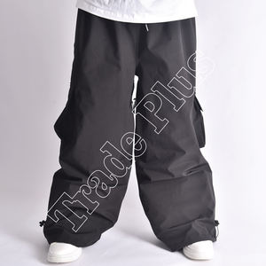 Uniesx Nouveau Pantalon de ski personnalisé en usine en tissu polyester imperméable et coupe-vent Pantalon de ski DTG brodé avec poches - Product Image 1