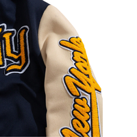 Blouson universitaire personnalisé de haute qualité en gros, broderie chenille, corps en laine, col montant, patchwork camouflage, motif dessin animé, style baseball