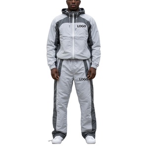 Veste zippée personnalisée en gros avec logo, ensemble de survêtement pour homme avec empiècements latéraux |   Survêtement coupe-vent en nylon uni pour homme - Product Image 1