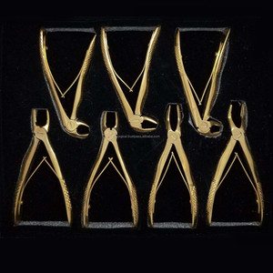 Juego de fórceps de extracción Dental chapados en oro de acero inoxidable Manual de 7 piezas | Instrumentos quirúrgicos de eliminación de dientes de bebé pedodónticos - Product Image 3