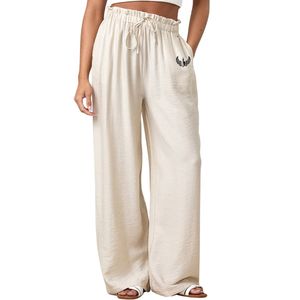Pantalon large décontracté en tissu ivoire tissé avec cordon de serrage pour femme – Léger et moderne pour un style de vie actif - Product Image 1