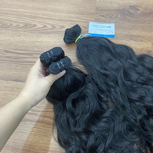 Extensiones de cabello ondulado natural de tendencia caliente Cabello humano vietnamita sin procesar de alta calidad Sin desprendimiento Sin enredos - Product Image 3