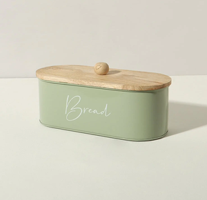 Panera ovalada de metal verde con tapa de perilla de madera, con la palabra 'Pan' en letra cursiva, disponible a precios de mayoreo - Product Image 1