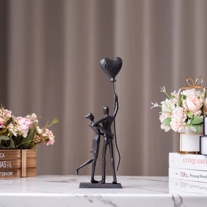 Las esculturas de pareja de metal más demandadas a menudo representan la unidad, el equilibrio y la armonía en las relaciones. - Product Image 2