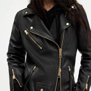 Venta al por mayor de la motocicleta chaqueta de cuero de oveja genuina para las señoras de las mujeres recortadas de estilo bombardero de Moda de Primavera chaqueta de cuero de las mujeres - Product Image 2