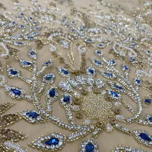 新设计2023串珠面料奢华刺绣珠子串珠蕾丝面料非洲蕾丝面料制造商和供应商来自印度