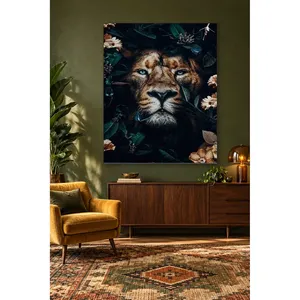 Impression sur toile du lion aux yeux bleus Fida parmi des feuilles sombres - Product Image 5