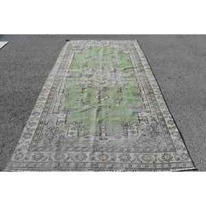 Alfombra Turca Vintage de 5.3x9.4 pies, Alfombra Grande, Alfombra de Lana Verde - Product Image 1