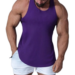 Venta al por mayor de tops deportivos tipo camiseta sin mangas para gimnasio y fitness, de color liso, con bajo curvo y diseño recortado, muy vendidos. - Product Image 4